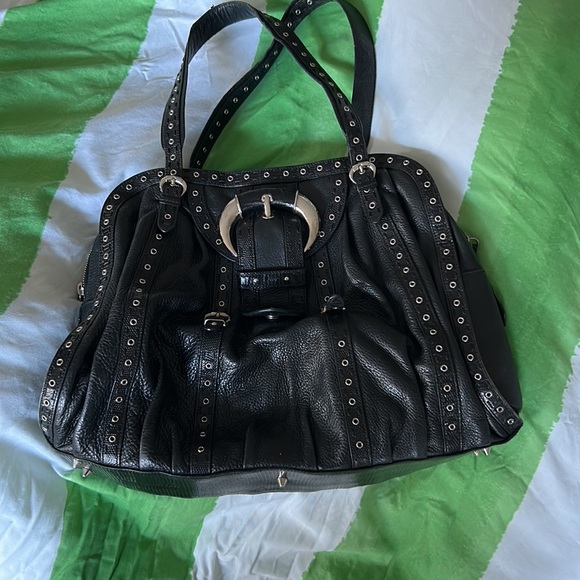 Christian Dior grommet bagPreloved has a few discoloration but not noticeable - Picture 2 of 9